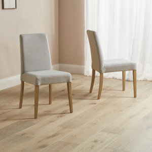 Beige fabric dining chairs pair
